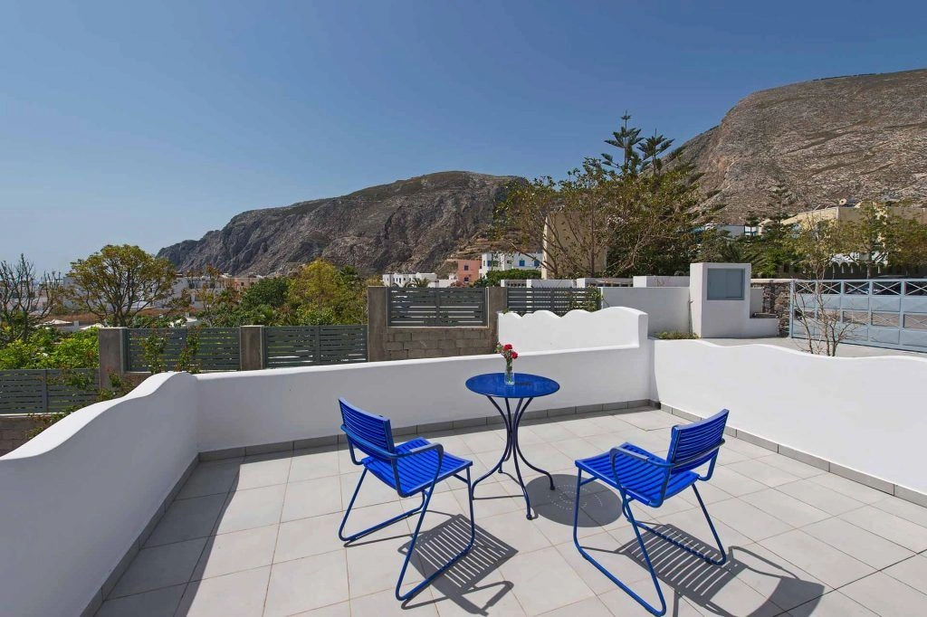 Villa Victoria balcony with mountain and sea views - Private terrace overlooking Santorini landscape
